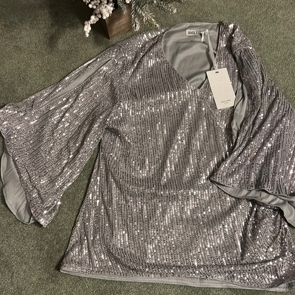 Holiday woman’s silver sequin top size large
